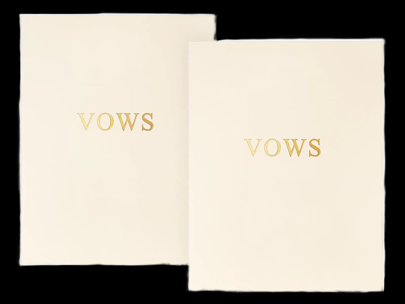 Two cream vow books with gold-foil VOWS titles, side by side.